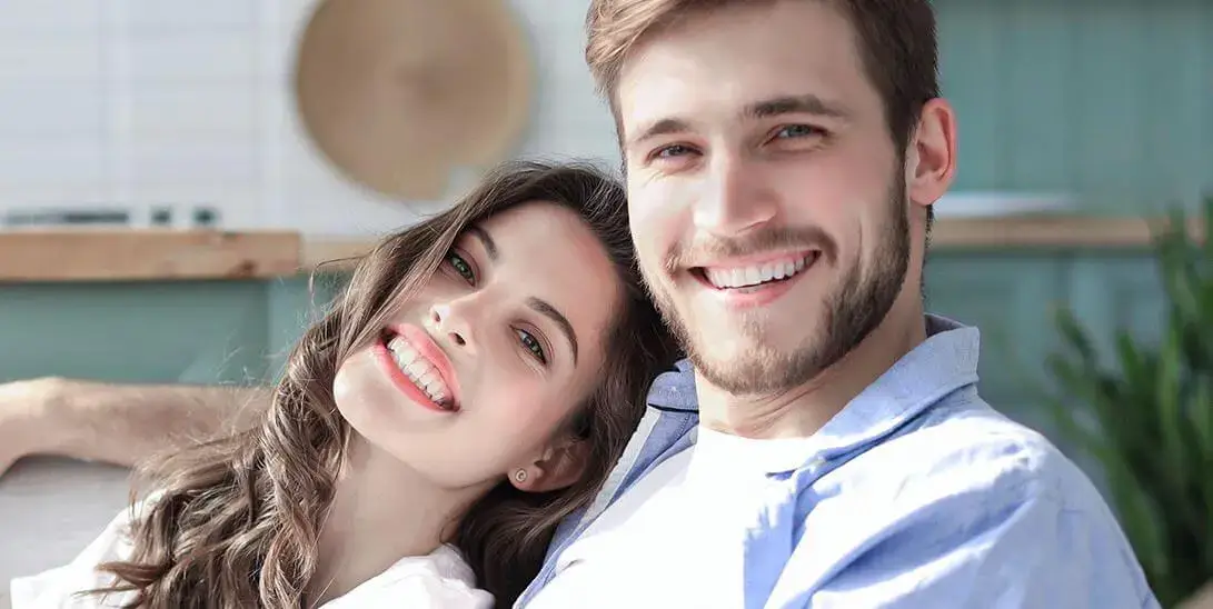 Smiling patients at Denison Dental in Denison, Texas