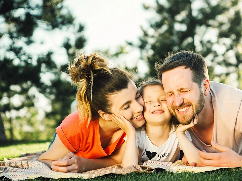 Family with healthy smiles after preventative dental care in Denison, Texas